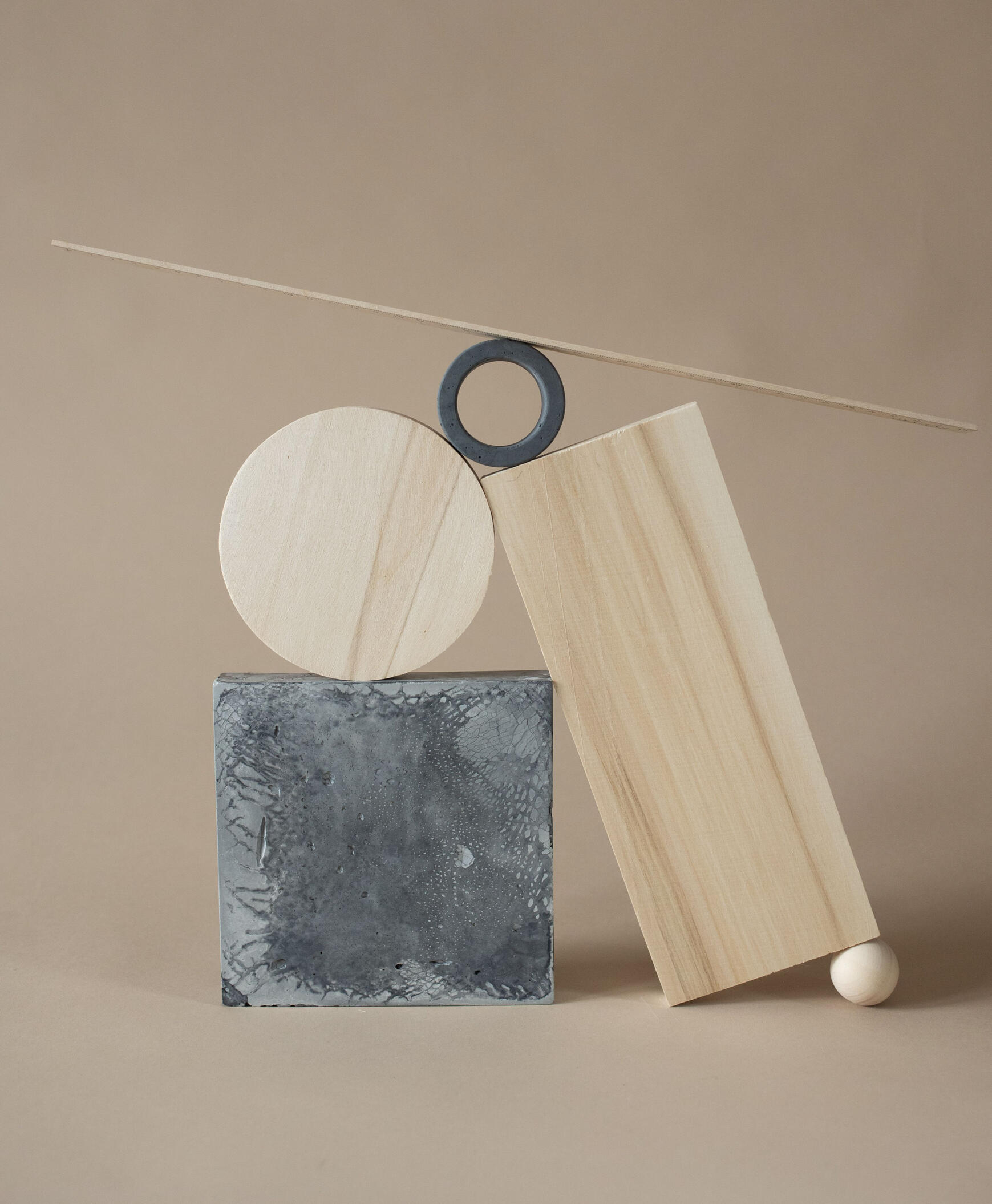 Image by Katrin Bolovtsova on Pexels Shapes balancing on one another